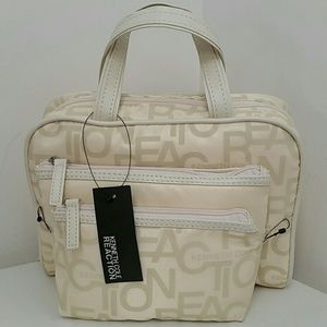Kenneth Cole Reaction 3 piece beige cosmetic bags.